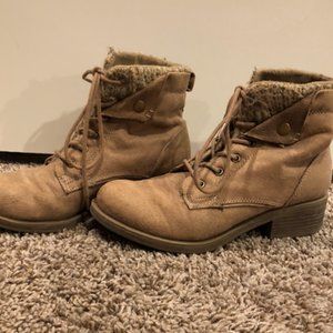 Brown suede hiking type boots.